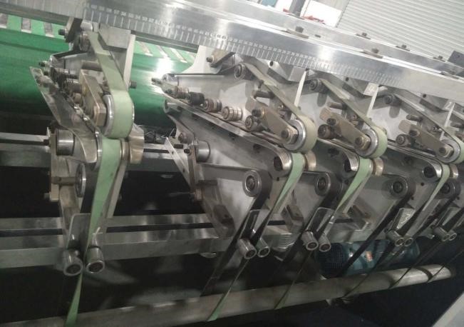 模切机带剥离功能